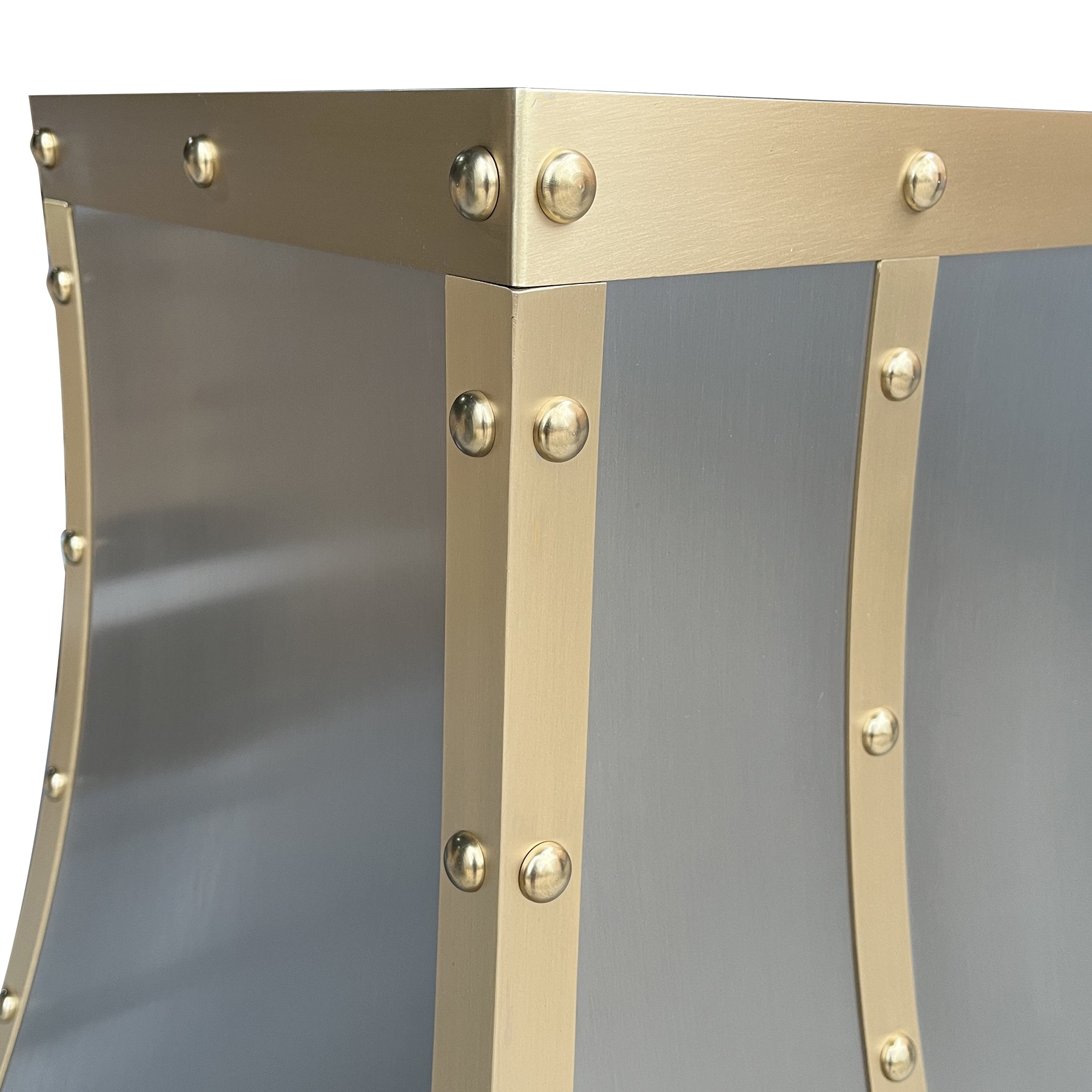 CKH industrial stainless steel range hood with brass rivet accents, showcasing industrial-chic kitchen ventilation design.
