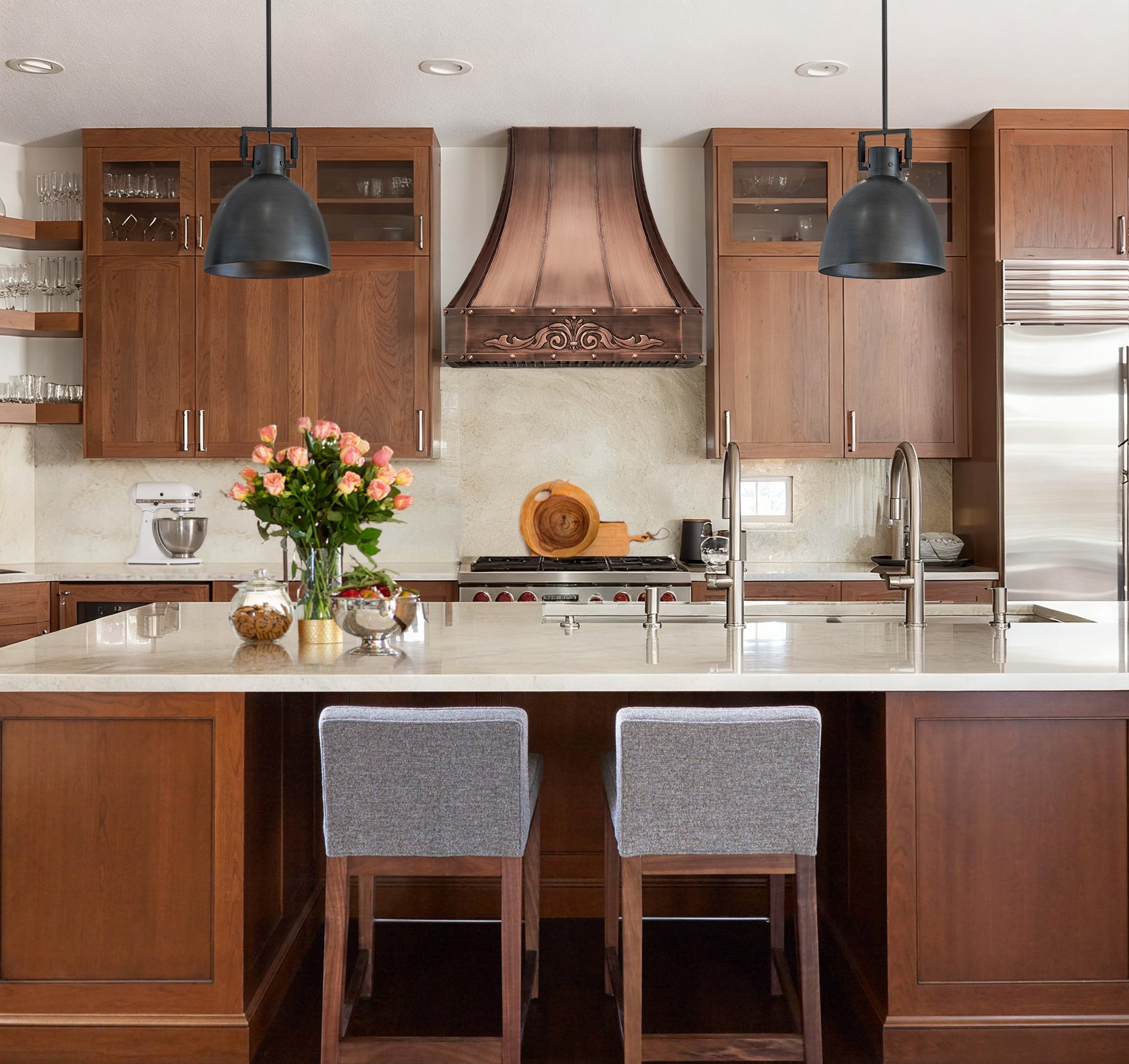 CKH C15 range hood featuring ornate carved detailing and rivet accents, showcasing craftsmanship and vintage-inspired design.