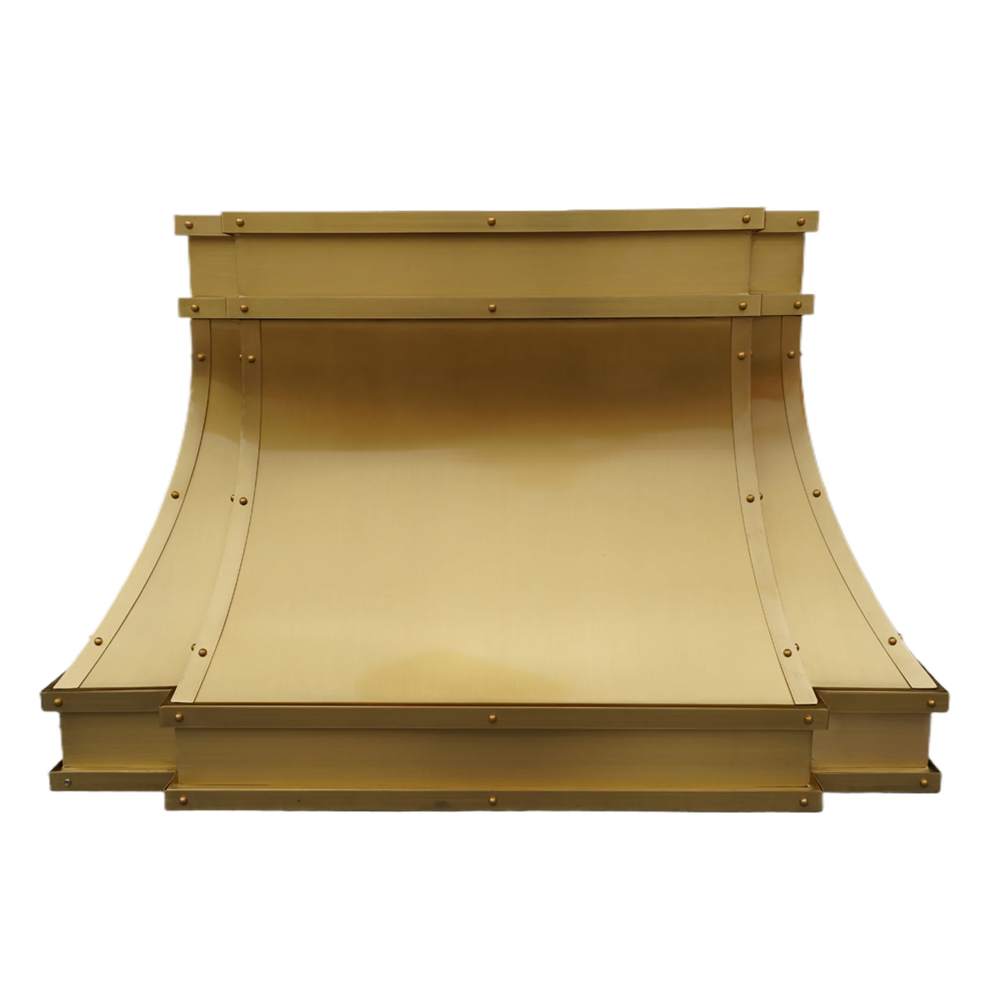 Custom brass range hood with chimney installed in modern kitchen