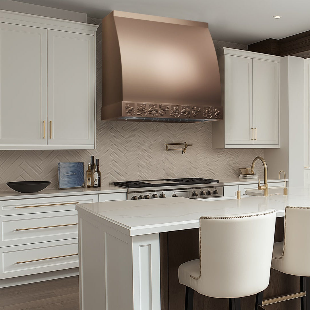 Brushed curved waist  copper hood with bird relief base, perfect for nature inspired kitchens with white cabinets,  a breakfast bar.