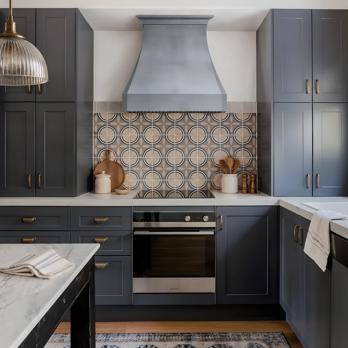 Curved Zinc Custom Range Hood in a Modern Kitchen