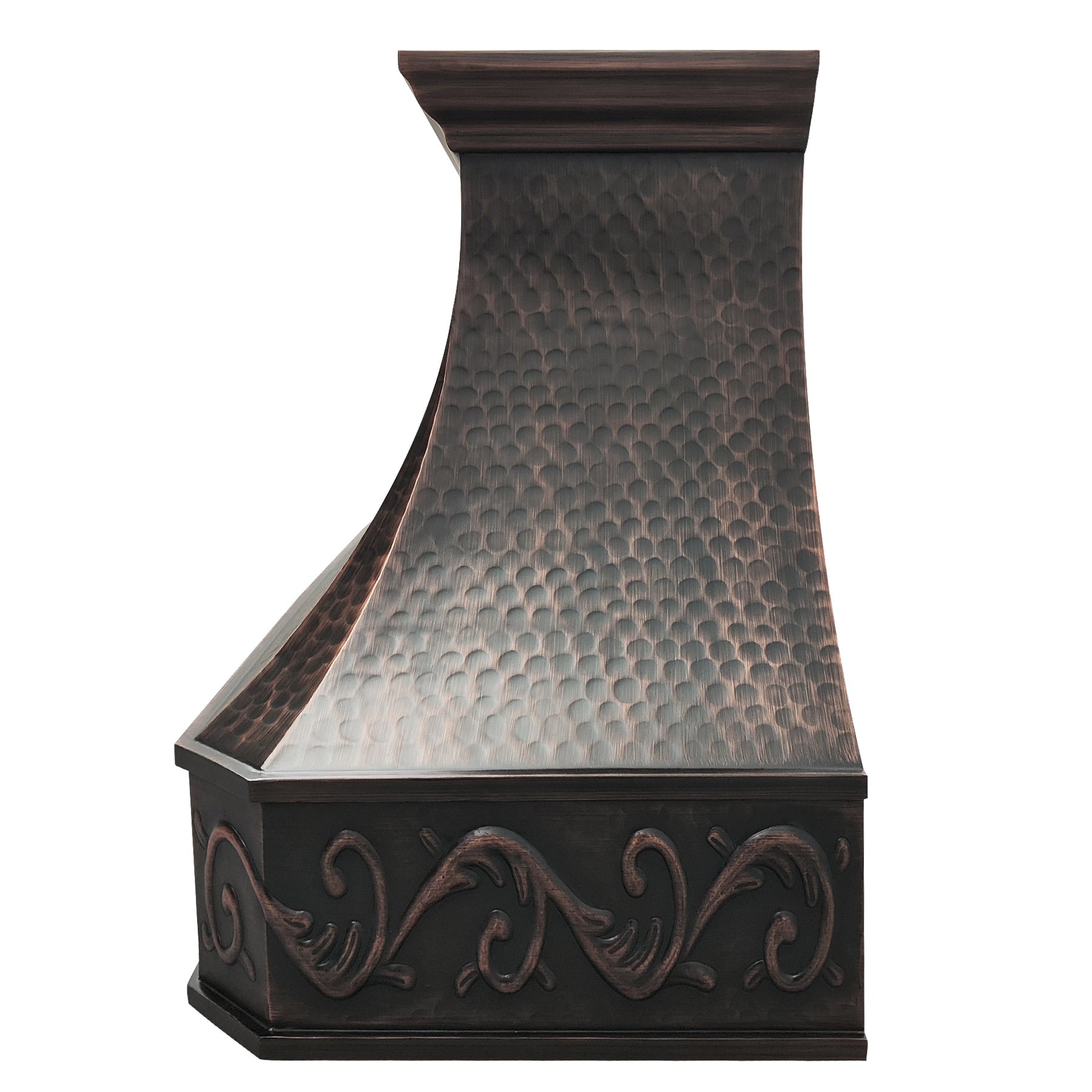Hammered antique copper range hood with decorative scroll patterns, showcasing handcrafted texture and vintage elegance