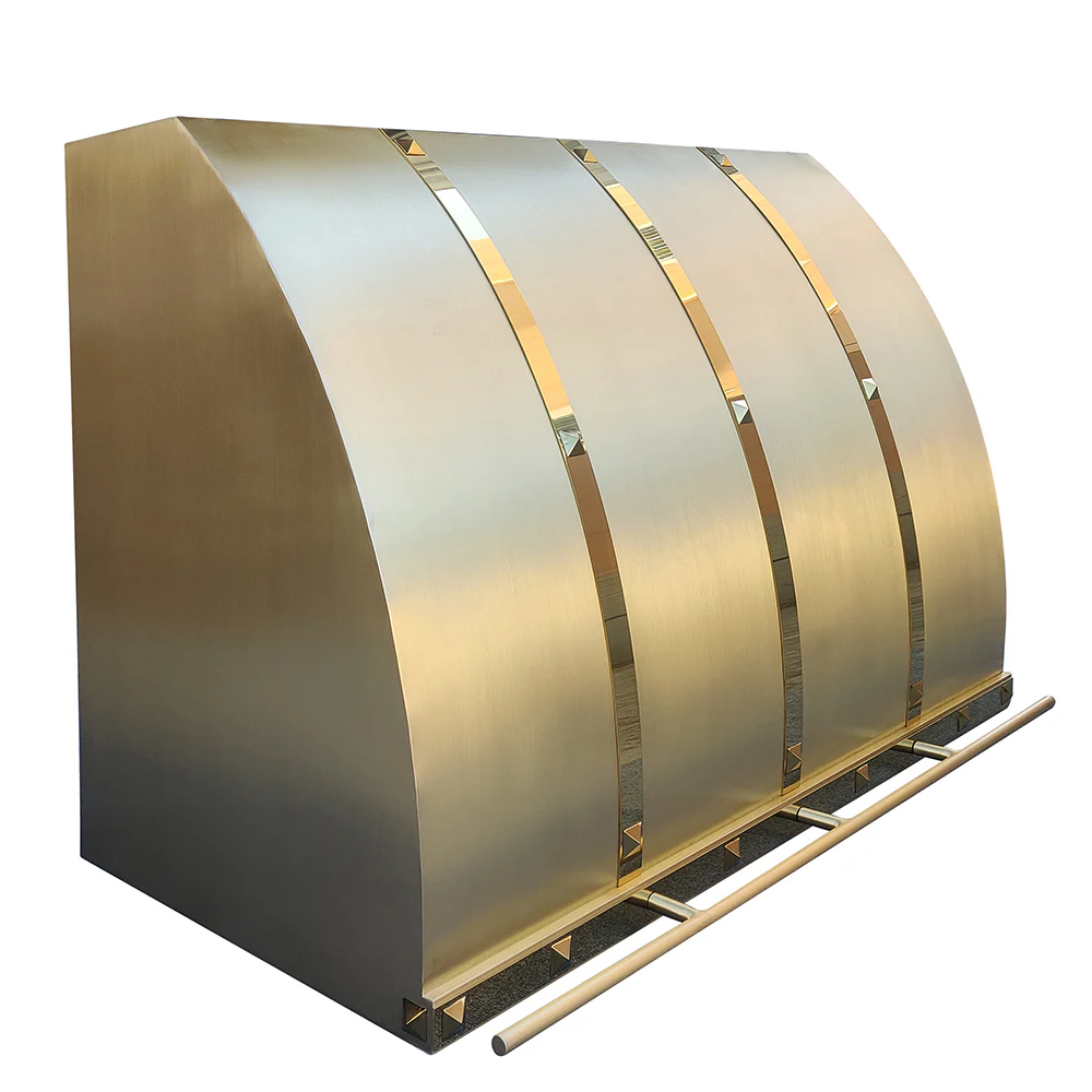 kitchen brass range hood with polished straps and square rivets