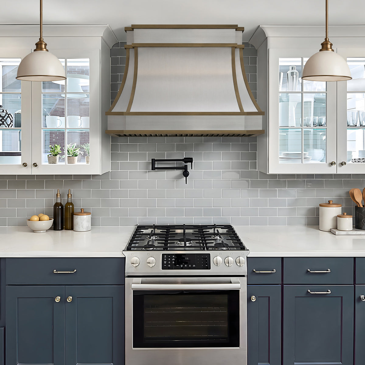 custom stainless steel kitchen range hood with antique brass straps
